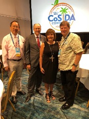 Lifelong friends. Bill Powers is with Lawrence Fan (San Jose State), Charlie Fiss (AT&T Cotton Bowl) and Joni James Lehmann (Big XII) at the 2019 CoSIDA Convention. James Lehmann and Powers worked together at Stephen F. Austin from 1995 to 1997. (Powers-Fan-Fiss-Lehmann)